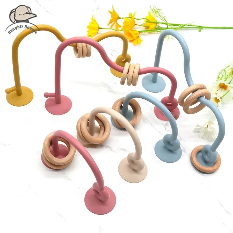 1 pz Baby Silicone massaggiagengive anello BPA Free sonagli braccialetto commestibile accessori per neonati giocattoli per la dentizione in Silicone del fumetto