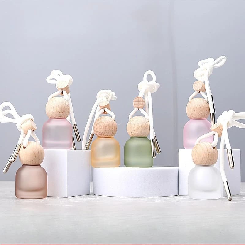 Bottiglia di profumo in vetro da 10 ml Deodorante per auto Diffusore di fragranze Ciondolo Mini Auto Ornamento Bottiglia di oli essenziali con tappo in legno