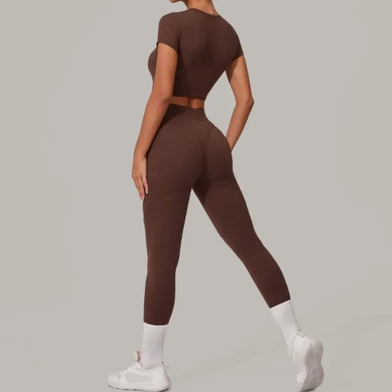 Allenamento in palestra Yoga Fitness Tuta sportiva Top a maniche corte Pantaloni imbottiti a vita alta per il sollevamento dei fianchi Abbigliamento sportivo per il tempo libero all'aperto