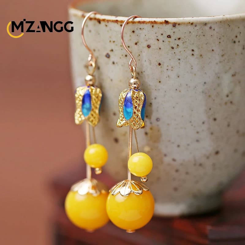 Orecchini etnici in argento con cera d'api a vento orecchini femminili cinesi con ambra a vento olio di pollo giallo vecchia cera Cloisonne regalo di gioielli Vintage