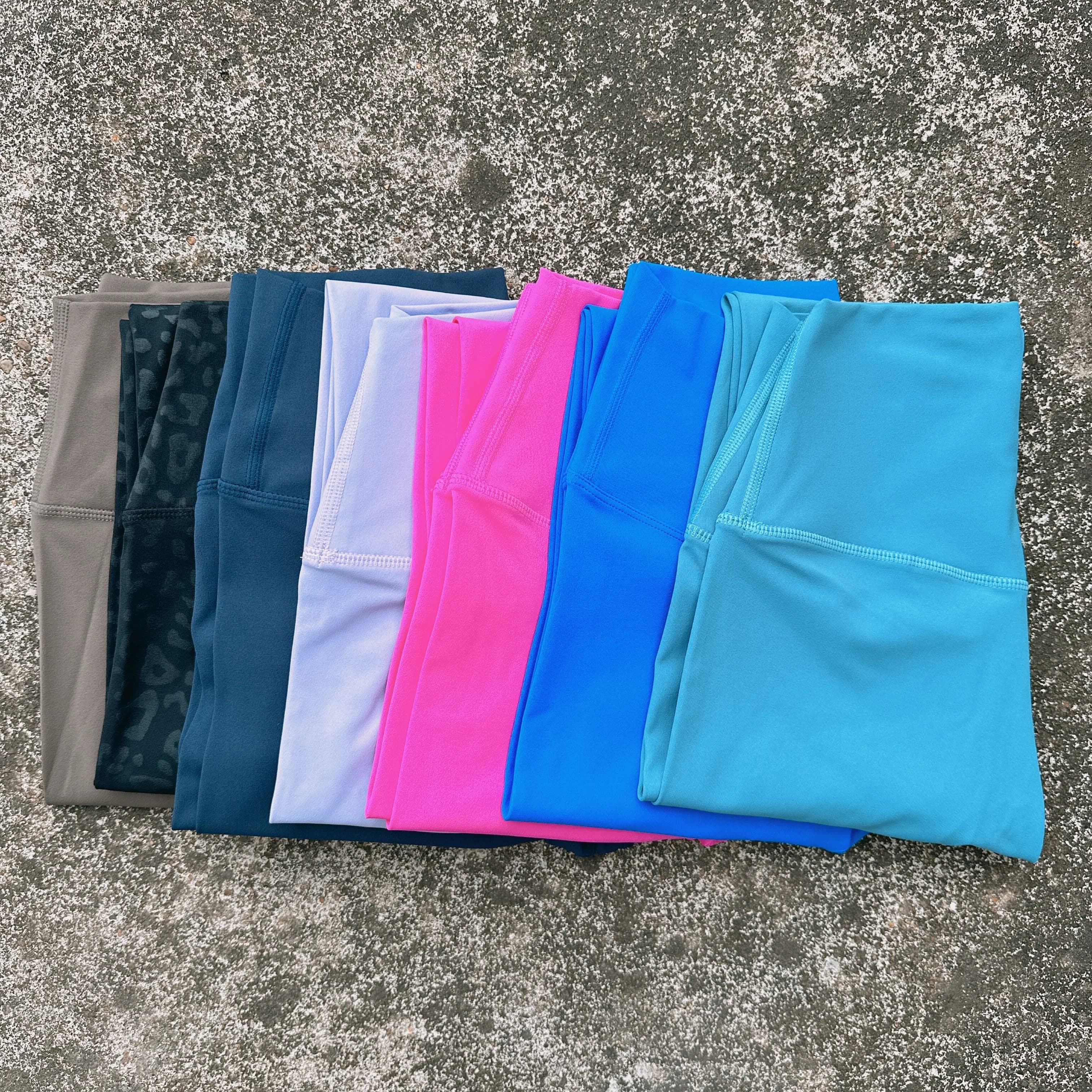 Leggings da yoga a vita alta tinta unita morbidi pantaloni sportivi da donna burro stretto palestra atletica allenamento completo jogging tasca posteriore in vita