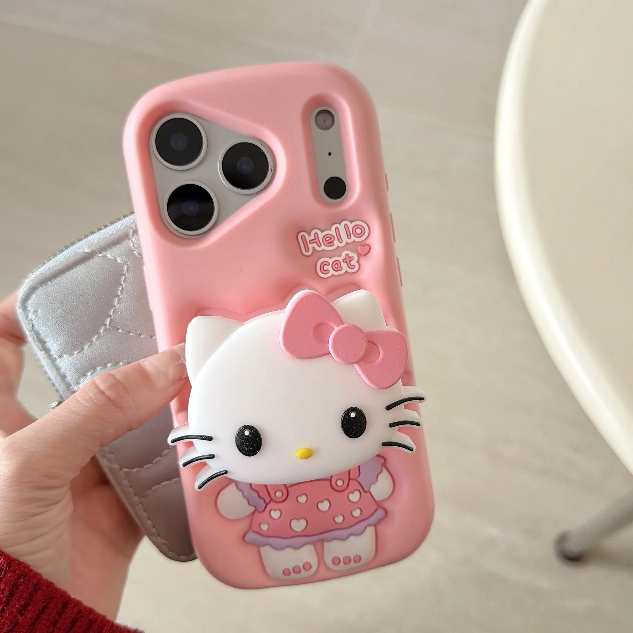 Cover per iPhone 17 16 15 14 13 Pro Max in silicone morbido con supporto 3D stereoscopico a forma di simpatico cartone animato Sanrio Hello Kitty